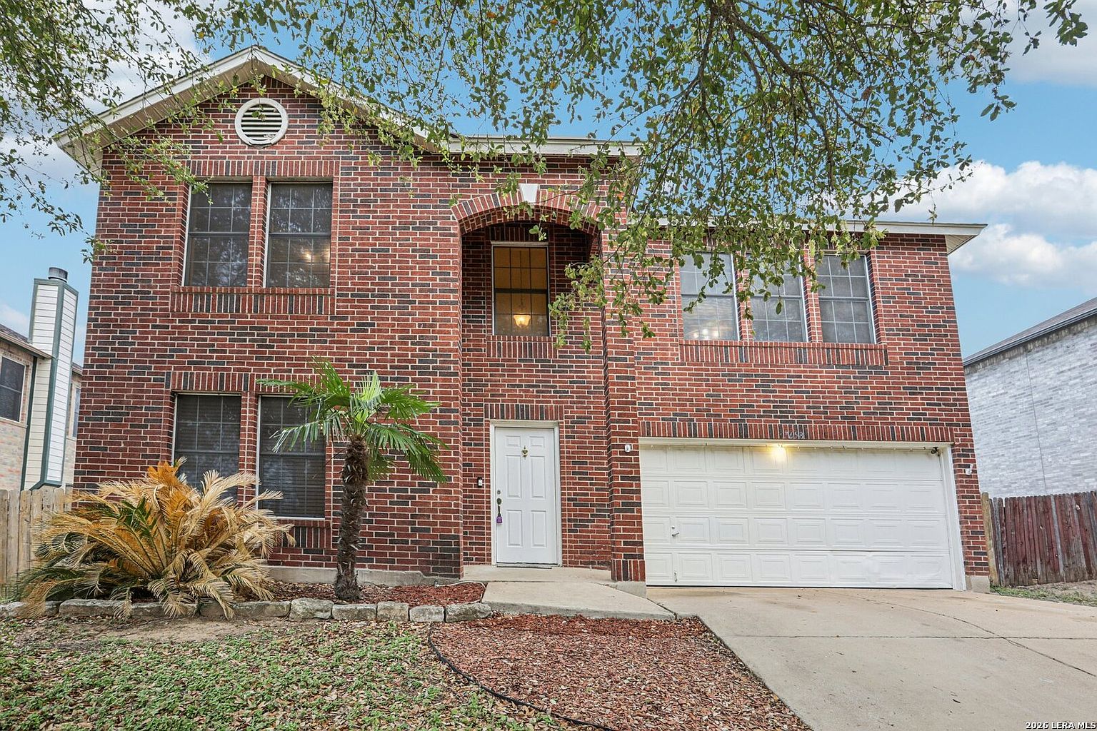 Greened up the front lawn — before